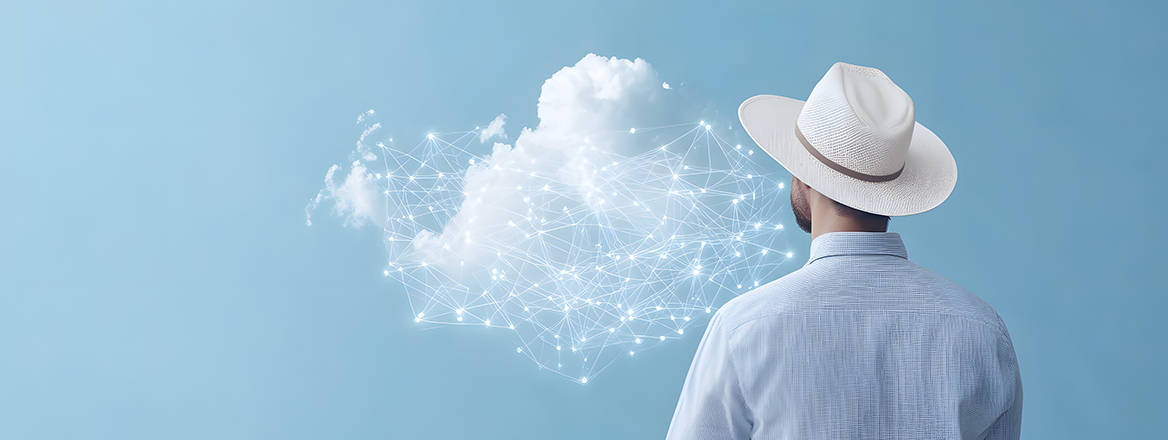 Conceptual image of a man in a white hat looking at a cloud computing concept on a blue background.