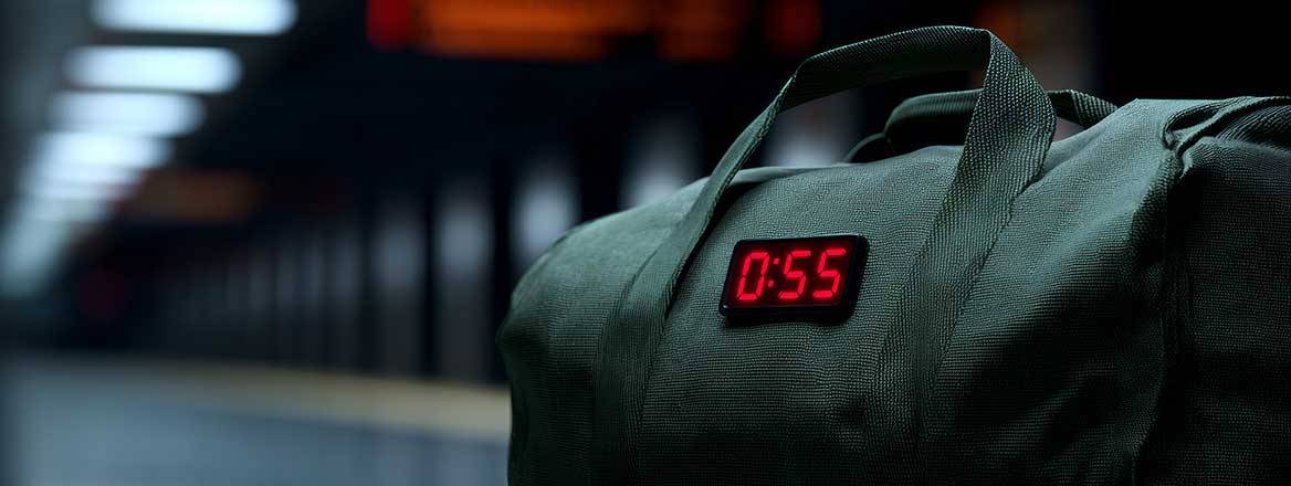 Image of a bomb in a bag on a train platform illustrating Russian sabotage