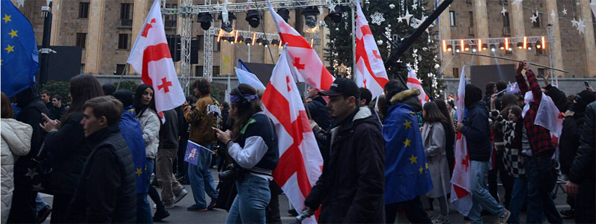 Tbilisi celebrates EU candidate status, December 2023. Georgia’s strategic identity was formed around both principles of fearing Russian power and a narrative of European linkages and Euro-Atlantic affinities. Courtesy of Jelger Groeneveld/Wikimedia Commons