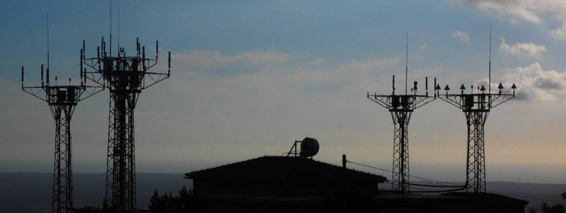Cellular towers at night