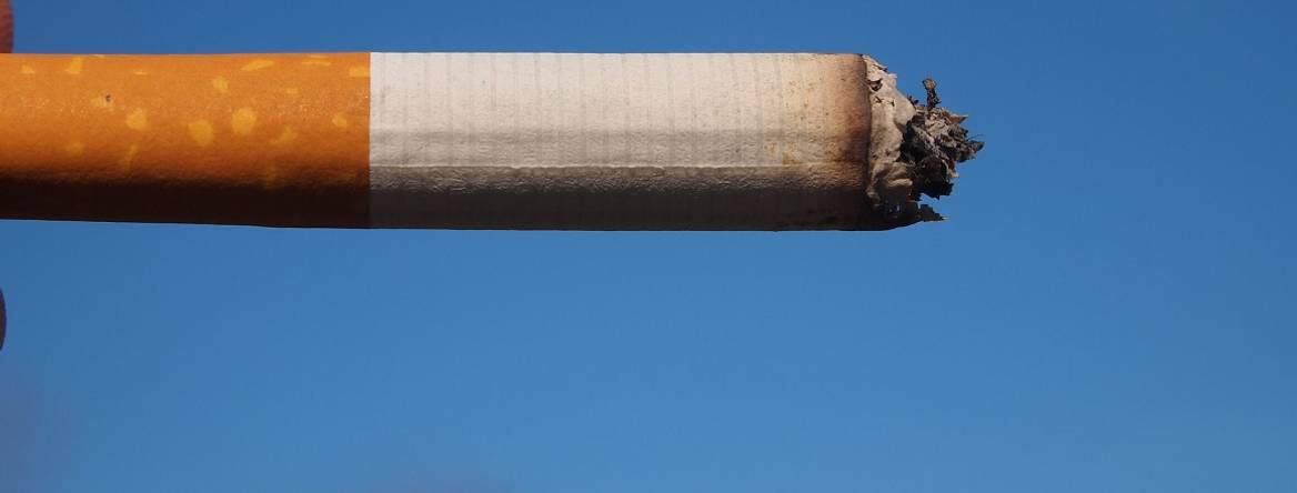 cigarette being burnt as it is smoked