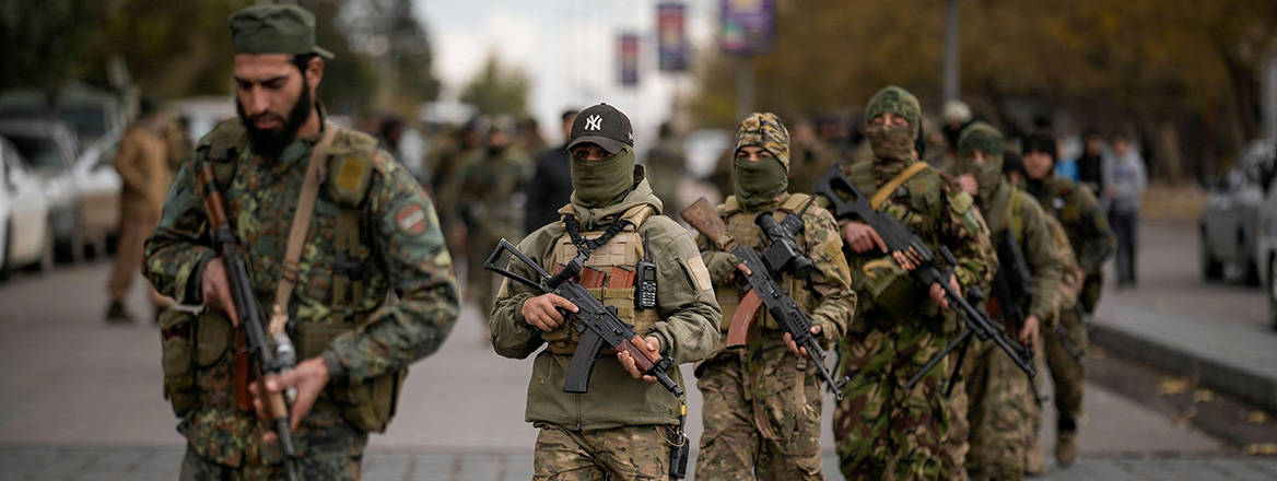 Changing of the guard: members of Syria's new armed forces, former rebels who overthrew Bashar al-Assad's government, march during a military parade in Damascus on 27 December 2024
