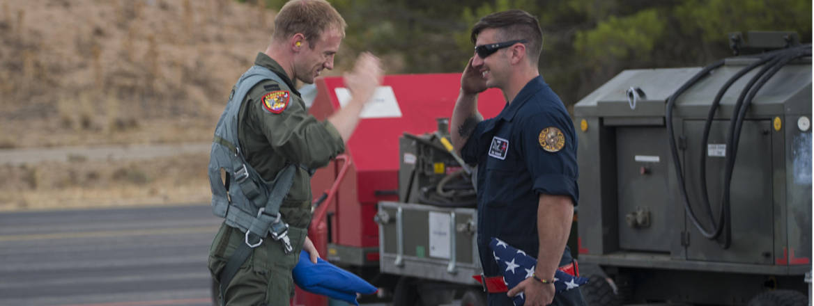 Dutch and US personnel saluting each other
