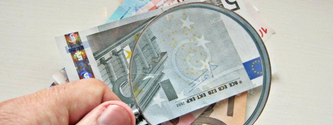 euros under magnifying glass