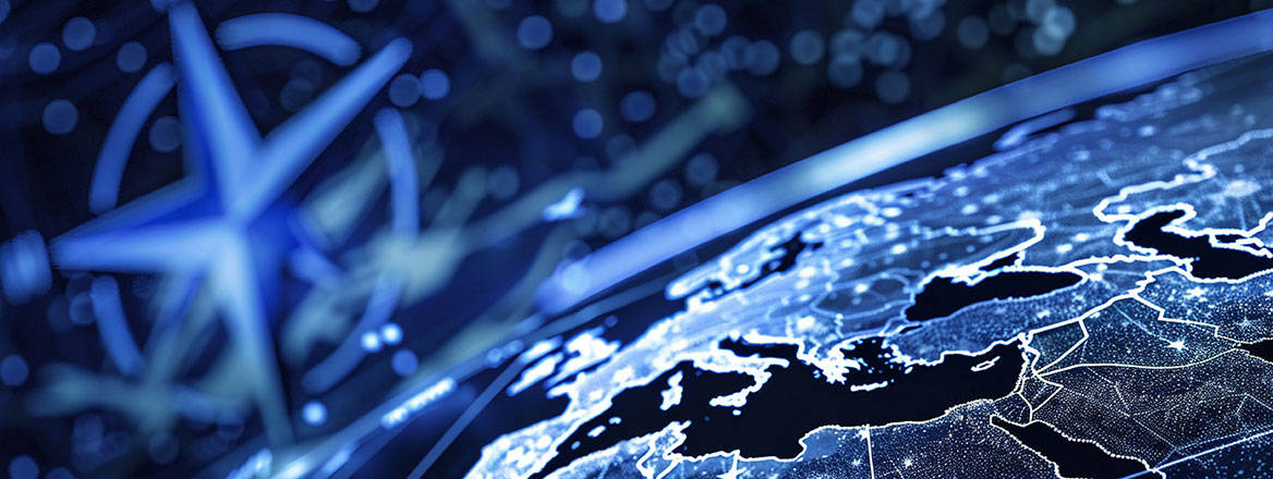 Globe with NATO logo to illustrate paper on cyber deterrence