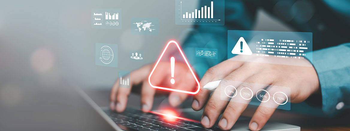 Hands at a keyboard representing fraud risk