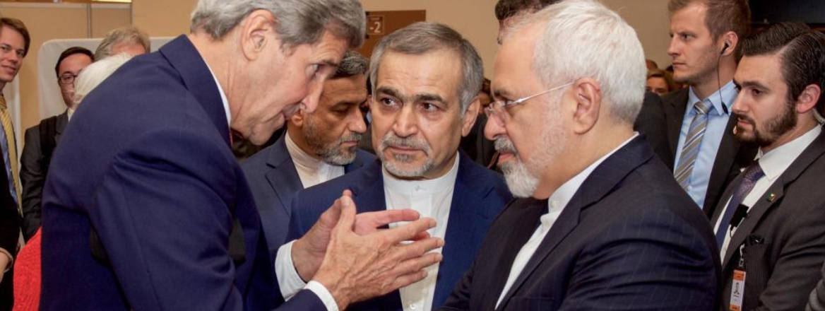 John Kerry speaks with Hossein Fereydoun and Javad Zarif