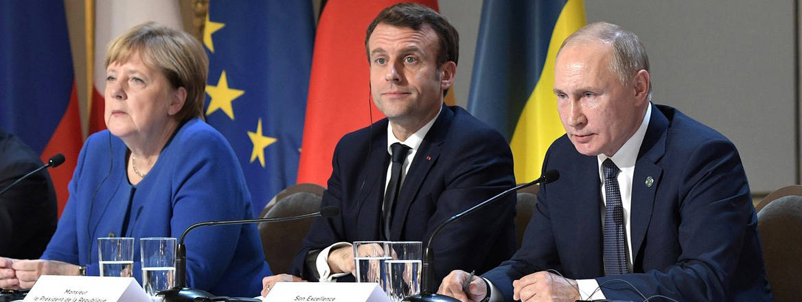Angela Merkel, Emmanuel Macron and Vladimir Putin at a summit in December 2019
