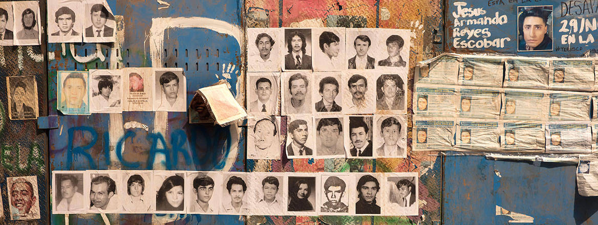 Images of missing people posted on makeshift memorial wall in Mexico City, Mexico, May 2022. Courtesy of Frank Nowikowski/Alamy.