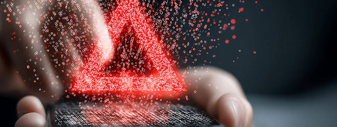 Mobile phone in someone's hands showing a virtual warning of cybercrime