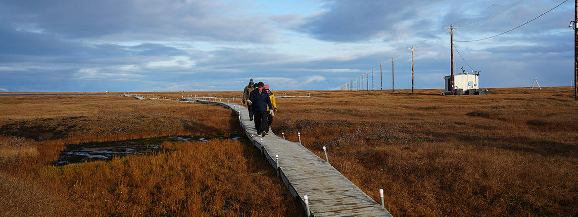 Randy Kee shows defence and security experts from Canada, Denmark, Finland, Iceland, Norway, Sweden, and the US the operational terrain of Utqiaġvik, Alaska, 27 September 2023. Courtesy of Amber E Kurka/Department of War