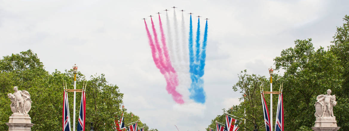 red arrows fly over Buckingham Palace