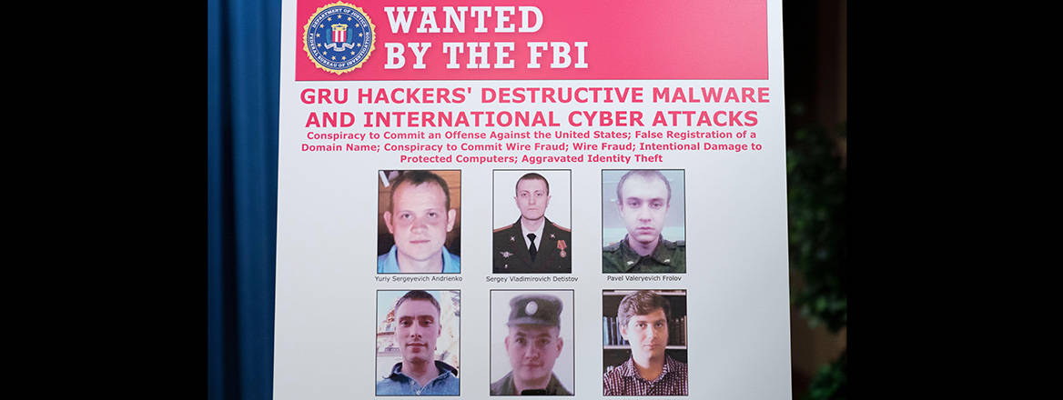 A poster showing six wanted Russian military intelligence officers, in Washington, DC, 19 October 2020. Attacks and disruptions have notably increased in 2024 and bear the hallmarks of sabotage. Courtesy of UPI / Alamy