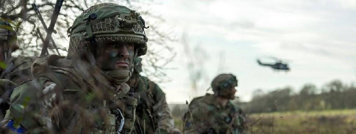 2 Para Regimental Sergeant Major watches on as his troops move into position