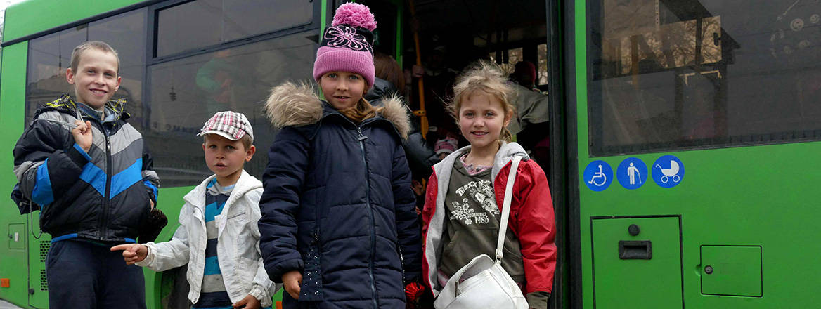 Victims of war: children prepare to board a bus from Mykolaiv to Odesa in April 2022