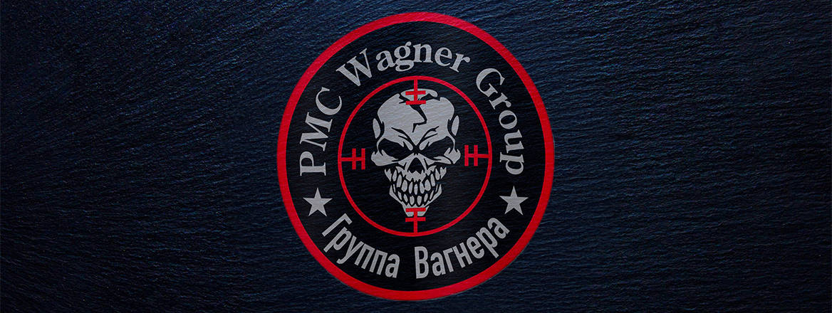 Wagner Group's logo on a black background with the words Wagner Group in English and Russian Cyrillic