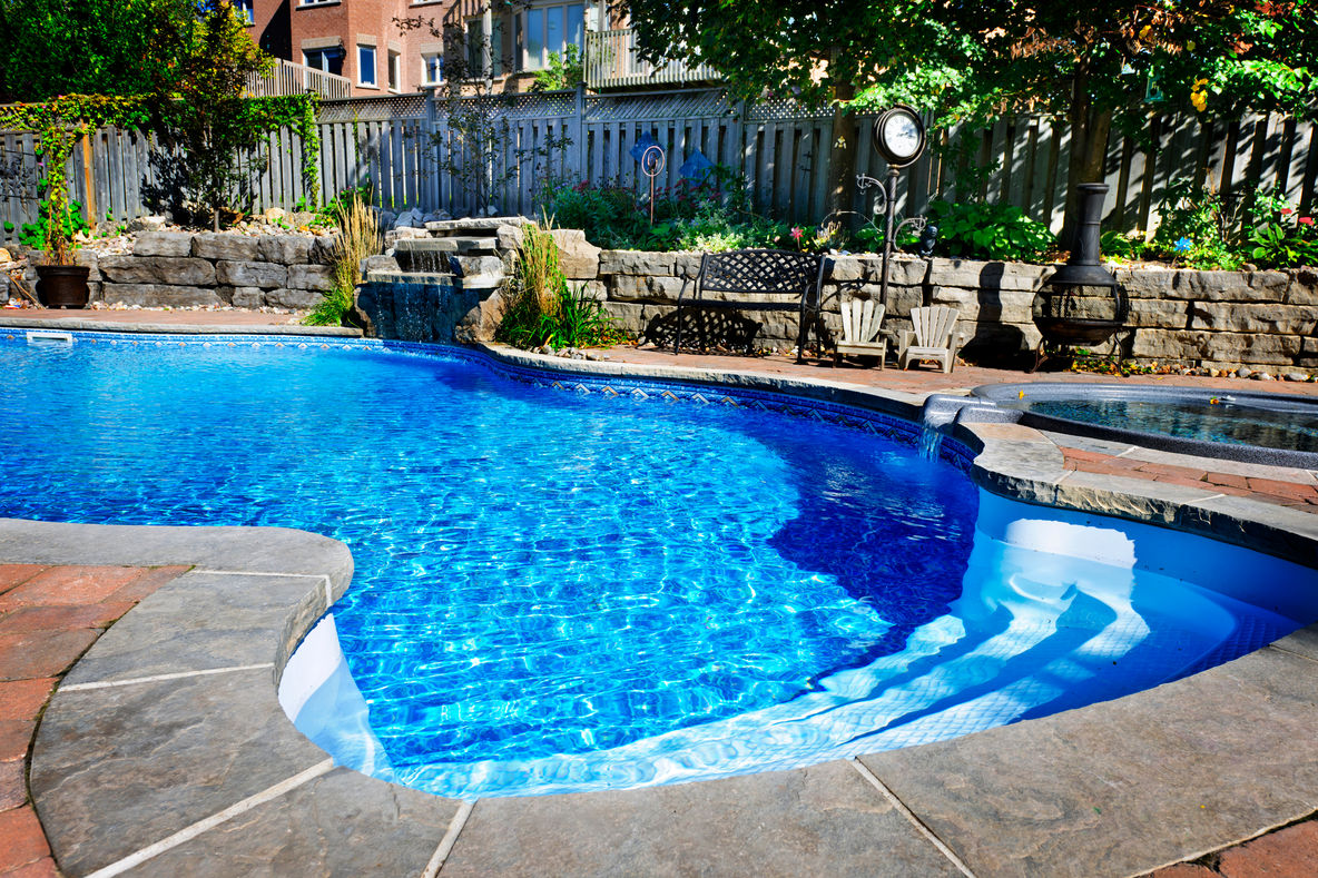 Swimming Pool With Stone Wall