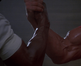 Arnold Schwarzenegger y Carl Weathers en Predator (1987)