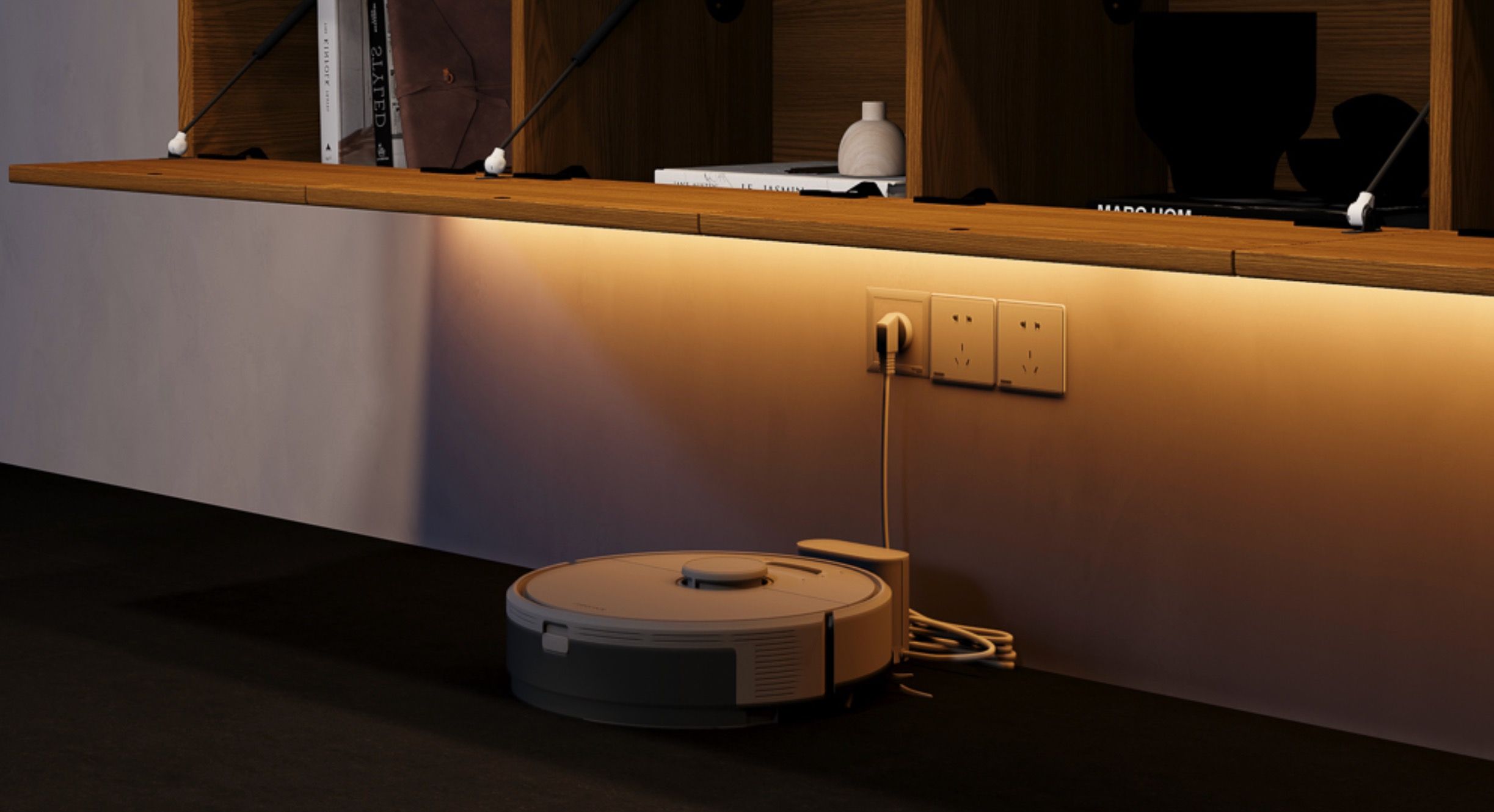 Robot Vacuum Cleaner Under a Povison Floating TV Stand