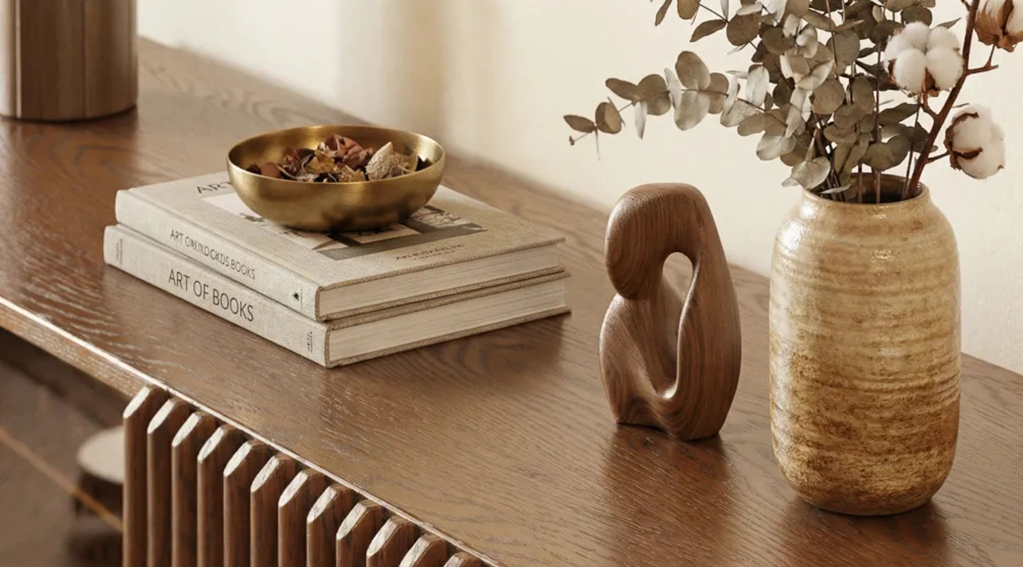 real wood veneer of the mid century modern tv stand, creating a natural vibe