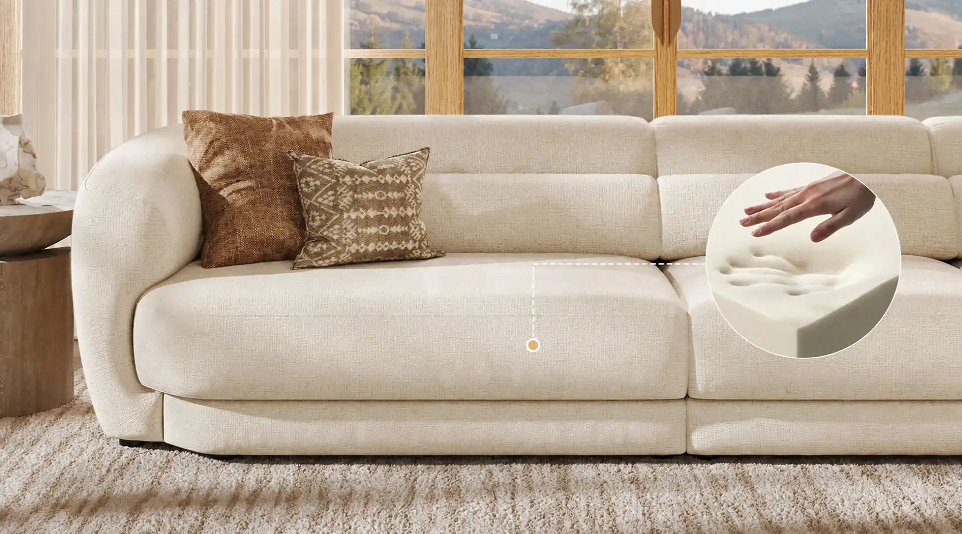 Cream plush sofa with thick cushioned seating and an inset showing soft foam compression for comfort and support.