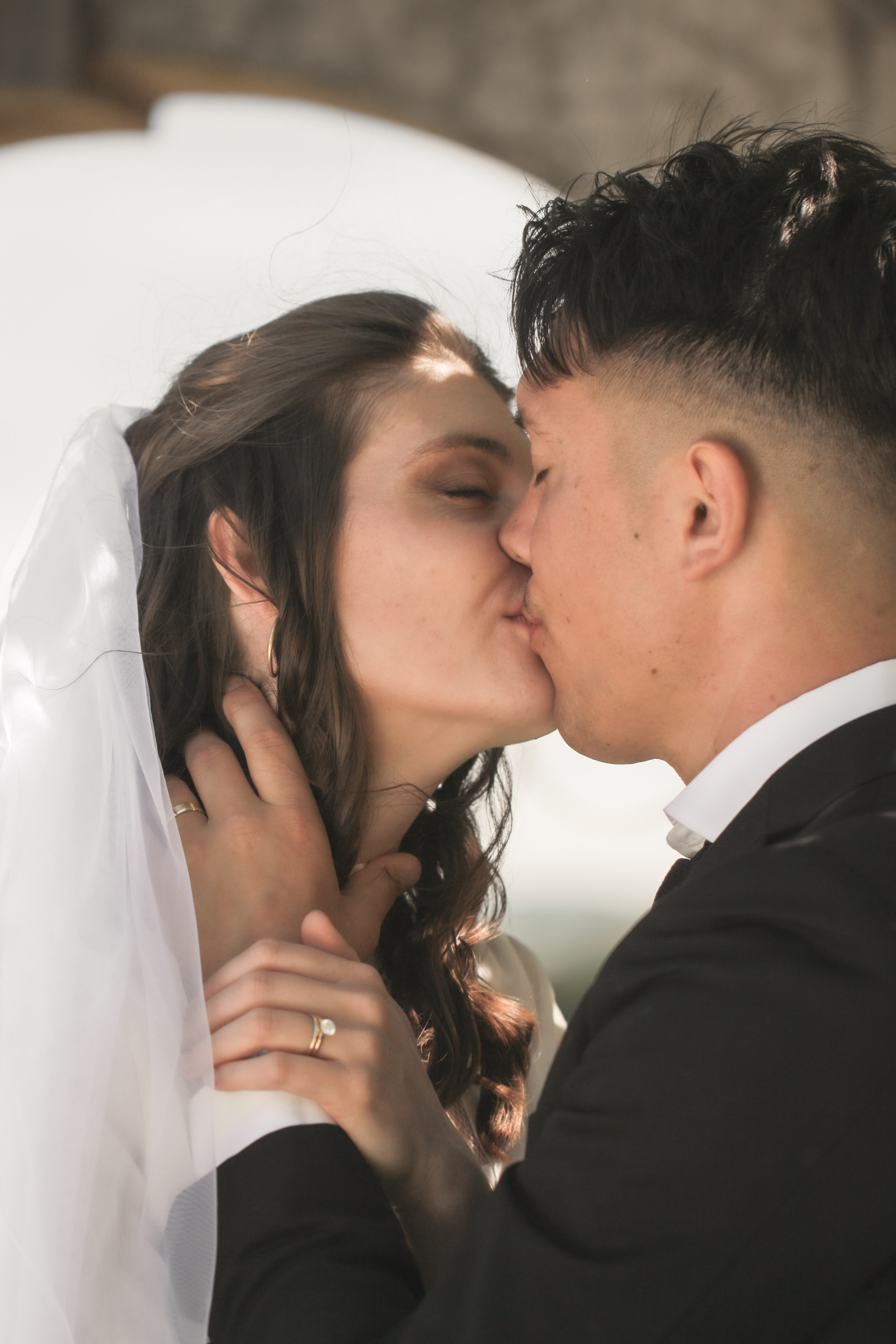 A quiet candid fleeting glance between couple inside an old Italian villa