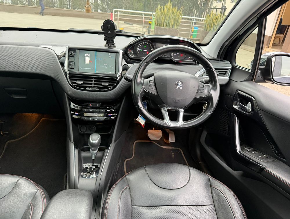 PEUGEOT 208 FULL LEATHER MOONROOF - PRG Motors Ltd