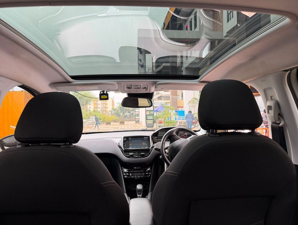 PEUGEOT 208 MOONROOF - PRG Motors Ltd