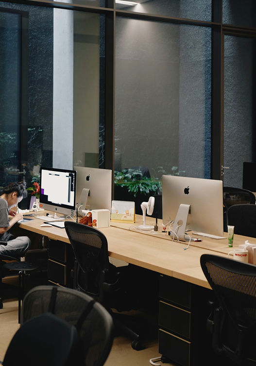 Primo Motif design studio team working on digital projects