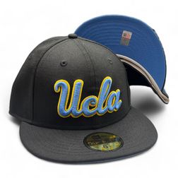 UCLA Bruins Black Cursive Logo Light Blue UV NCAA New Era 59FIFTY Fitted Hat