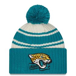 Jacksonville Jaguars New Era 2022 Cream NFL Sideline Sport Pom Cuffed Knit Beanie Hat