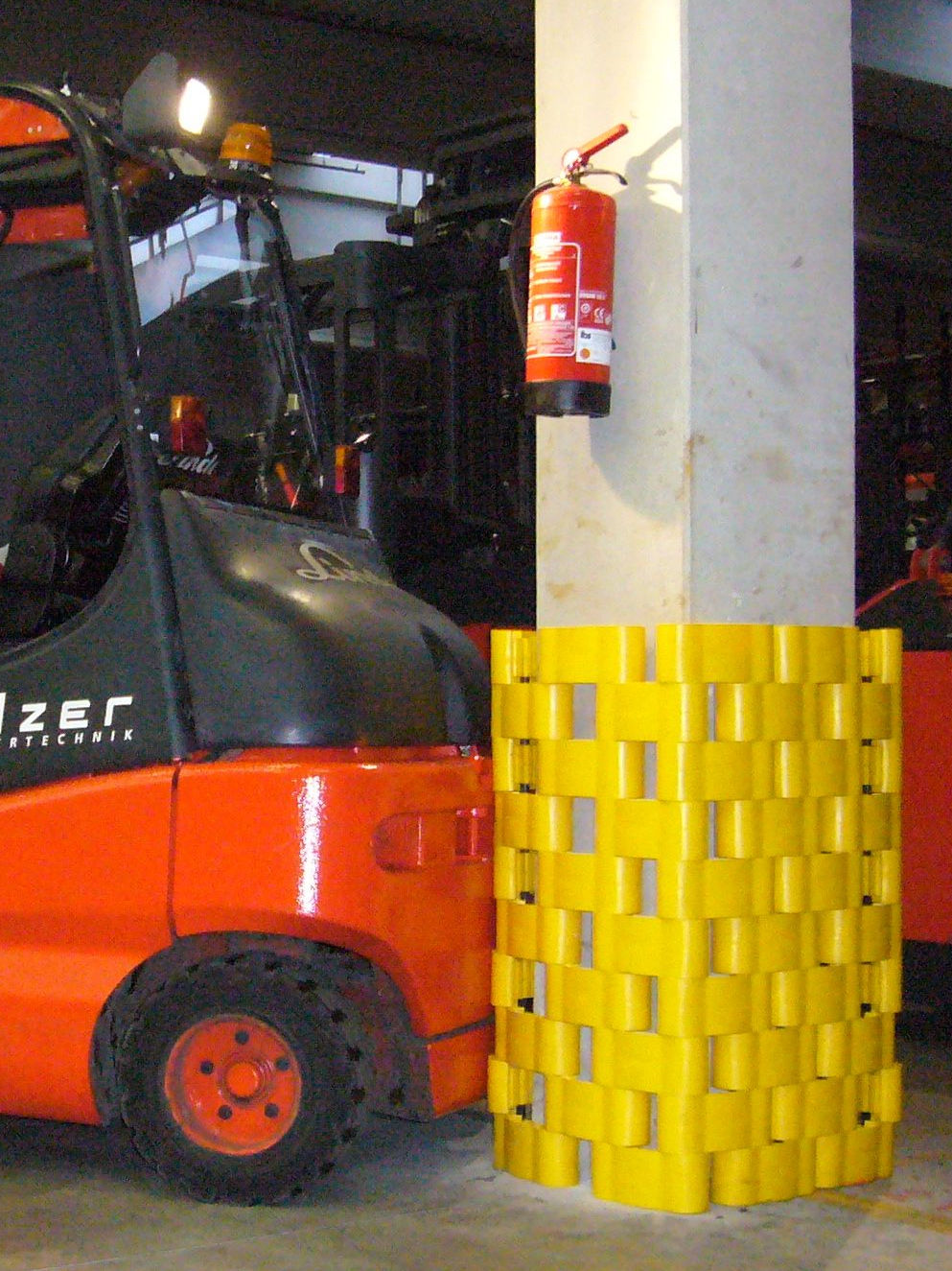 Protect-it MAXI guard protecting a concrete column from forklift damage