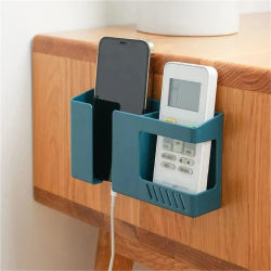 Soporte de pared sin perforaciones para control remoto de TV y soporte de carga para teléfono móvil (1 unidad)