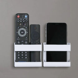 Organizador multifuncional montado en la pared para mandos a distancia y teléfonos móviles