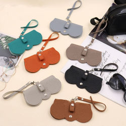 Funda para gafas con relieve de Litchi, bonitas gafas de sol colgantes de cuero PU, bolsa de almacenamiento para gafas de lectura, soporte portátil para gafas de viaje, 1 ud.