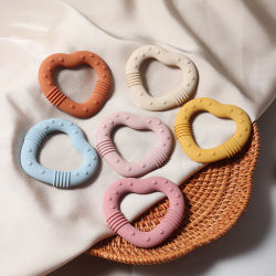 Mordedor de Silicona de Grado Alimenticio con Forma de Corazón, Nuevo Juguete de Dentición para Bebés, Mordedor de Silicona para Aliviar las Molestias de los Bebés, Juguete Masticable Cómodo