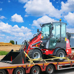 Cargador de ruedas compacto con motor Kubota, gran oferta, cargador de transporte todo terreno 4WD, minicargador articulado CE/EPA con cabina personalizada