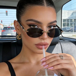 Gafas de sol de moda retro sin montura para mujer, adecuadas para el desplazamiento diario