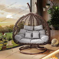 Sillón colgante de mimbre para exterior e interior, tipo cesta, con función de columpio y hamaca nido, ideal para patio y balcón doble, estilo popular en internet.