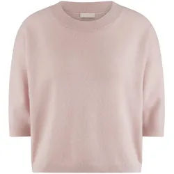 Le pull include rosé