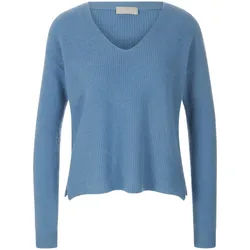 Le pull include bleu
