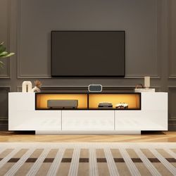 TV-bänk 180x40x48 cm, vit + svart högblank, LED, L-form, lådor, för 75-tums TV