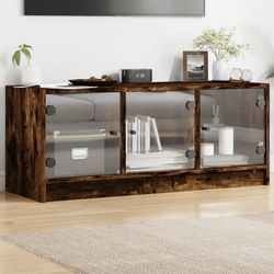 Elegant TV-bänk med glasdörrar - Förvaring och stil | Färg: Rökfärgad ek | Storlek: 102x37x42 cm