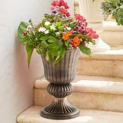 Traditional Embry Plastic Urn Planter by BrylaneHome in Bronze