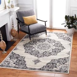 SAFAVIEH Brentwood Coral Distressed Medallion Rug