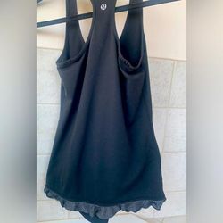 Lululemon Athletica Tops | Lululemon Athletic Racerback Tank With Ruffle Detail | Color: Black/Gray | Size: 4