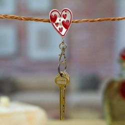 Passion Everyday,'Heart-Shaped Zamac Metal and Red Resin Keychain'