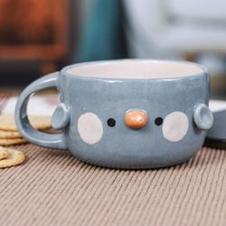 'Whimsical Handcrafted Glossy-Finished Ceramic Bluebird Cup'