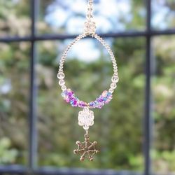 'Handcrafted Worry Doll-Themed Pink Crystal Beaded Suncatcher'