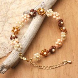 'Floral Gold-Accented Crystal Beaded Bracelet in Warm Hues'